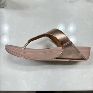 Fit Flop NWT/box never worn. Rose gold sandal